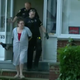 Patricia Edelen being taken into custody by police